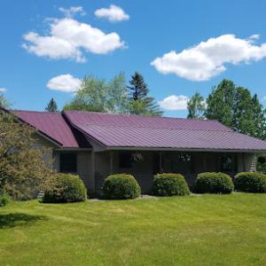 North Woods Roofing & Construction AE