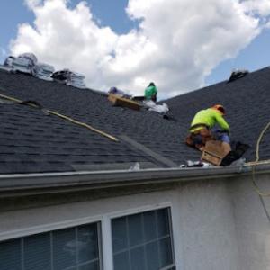 Economic Roofing & Siding -- Lowest resonable estimate